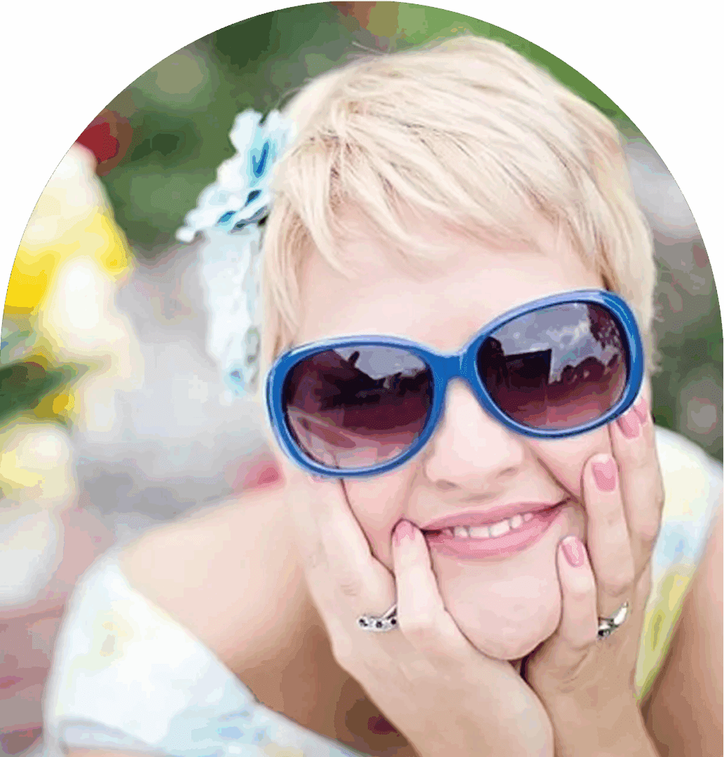 Woman smiling with blue sunglasses